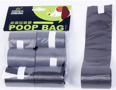Grey dog waste bag rolls with retail packaging and one bag unrolled