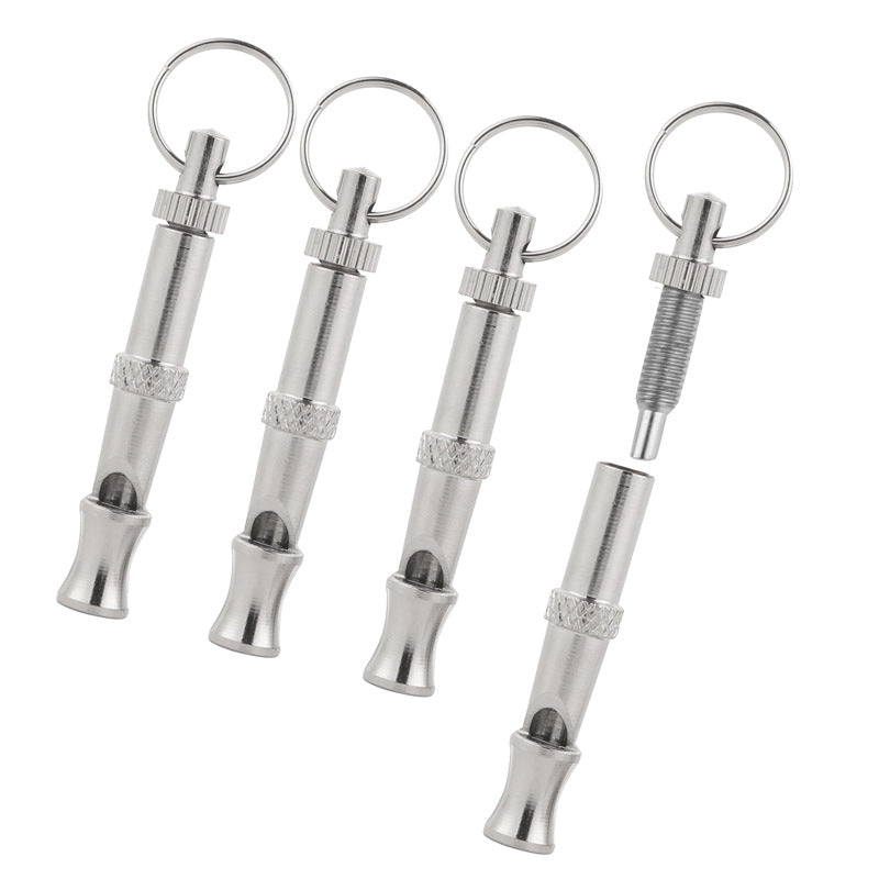 Four adjustable ultrasonic dog whistles showing the keyring and adjustable pitch barrel